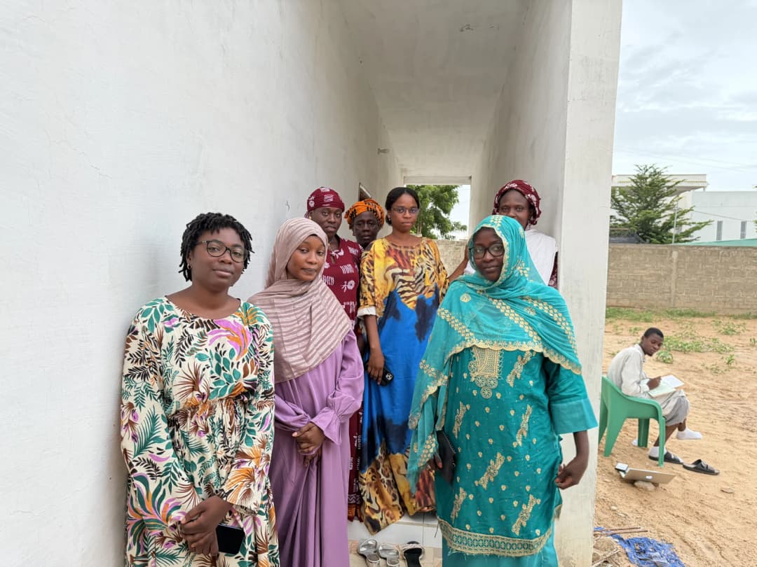 Women gathered at the Womanity site in Touba